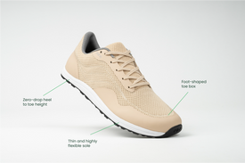 Profile view Bahé Revive barefoot style grounding shoes in Sandstone (beige) with shoe benefits callouts