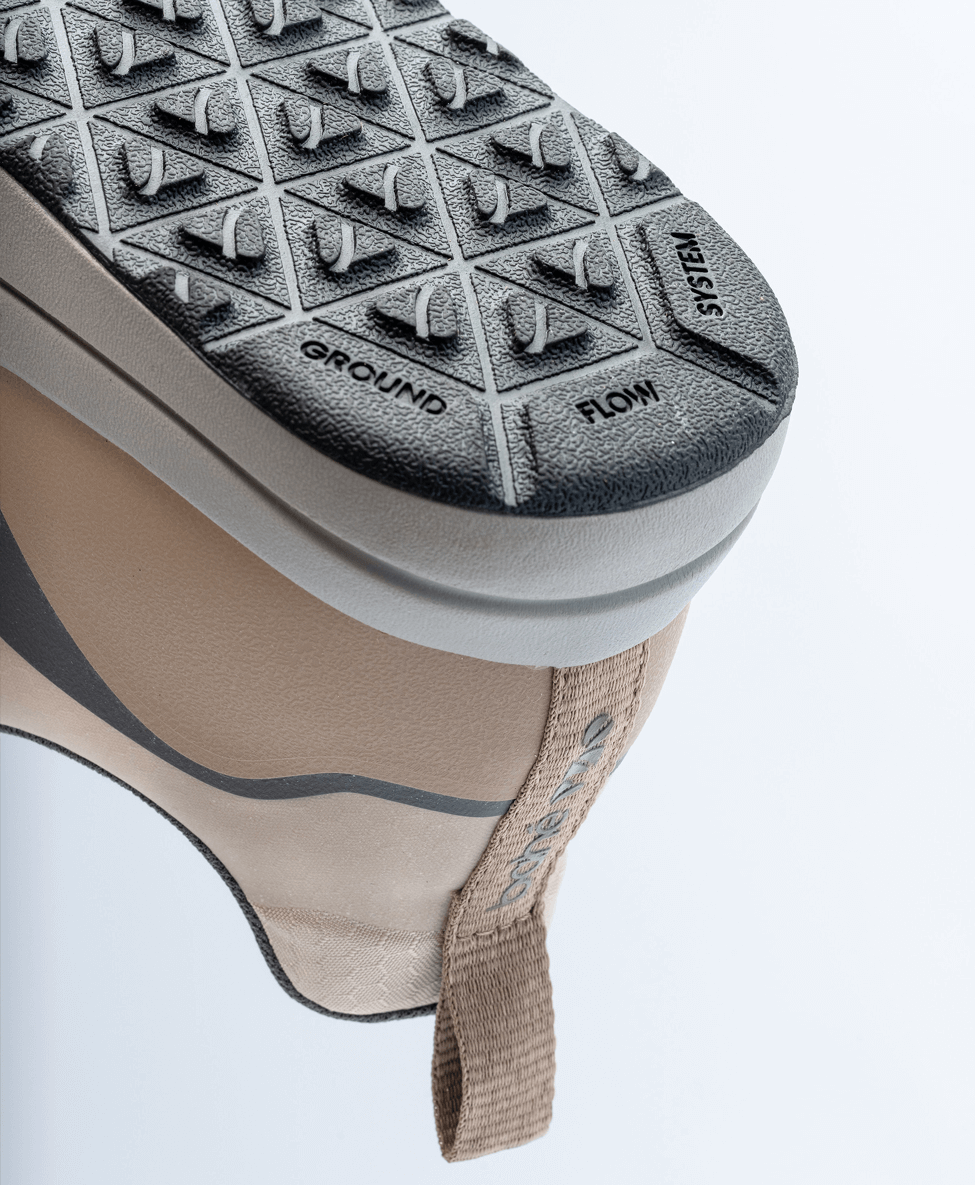 the macro details of the Bahé shoe showing the Ground Flow System