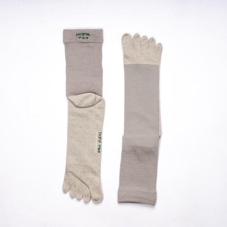 Bahe Flow Grounding five-toe socks laid flat, showing front and sole view.