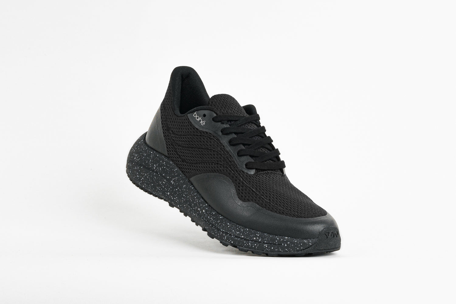 Dynamic/angled view of Bahé Recharge grounding shoes in Eclipse (black)