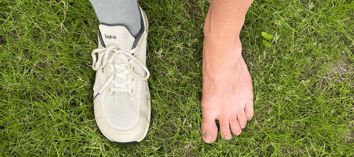Foot in Bahé shoes and also barefoot on grass