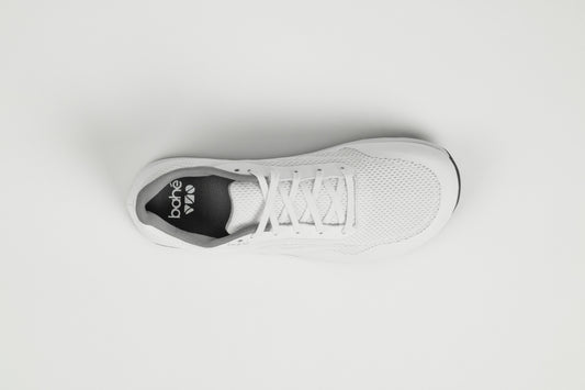 Aerial view of Bahé Revive barefoot style grounding shoes in Frost (white)