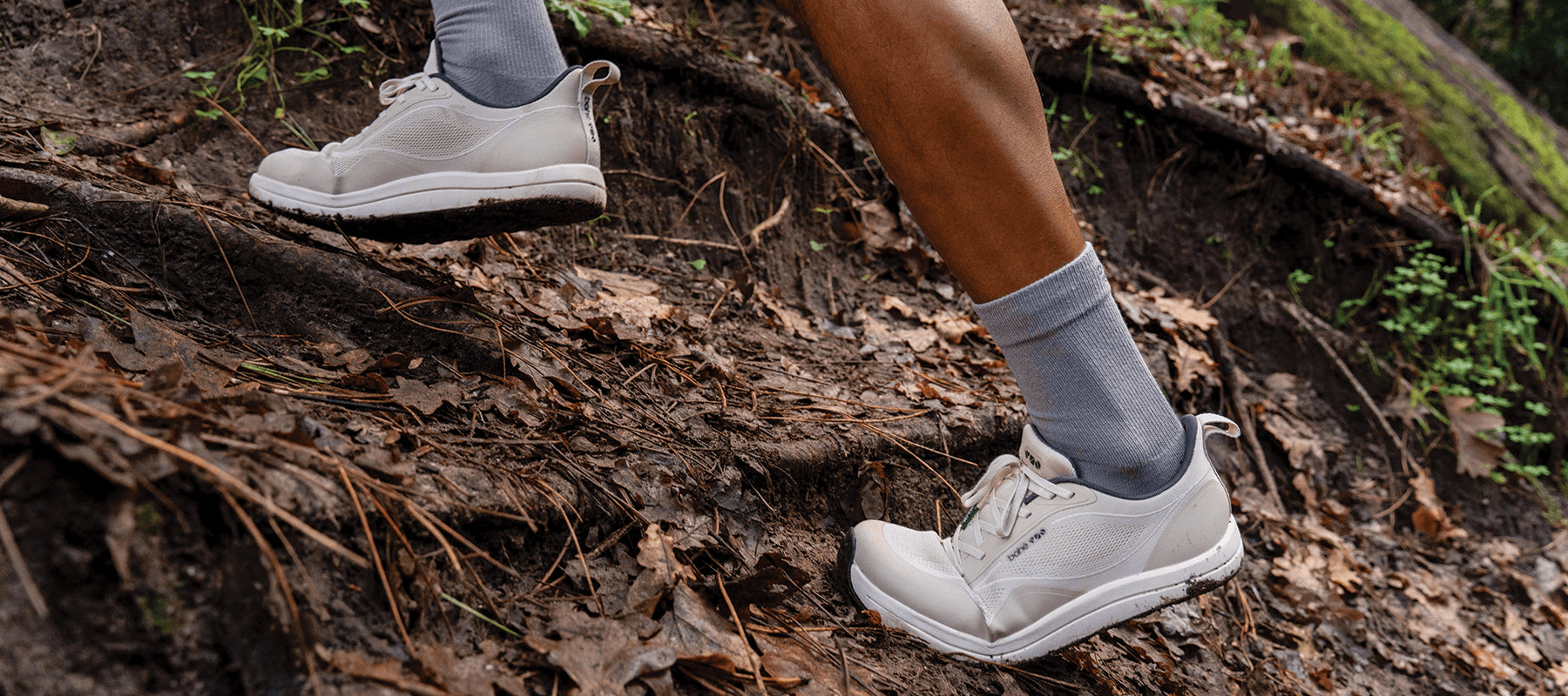Person running up hill in Bahé shoes