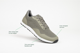 Profile view Bahé Revive barefoot style grounding shoes in Forest (green) with shoe benefits callouts