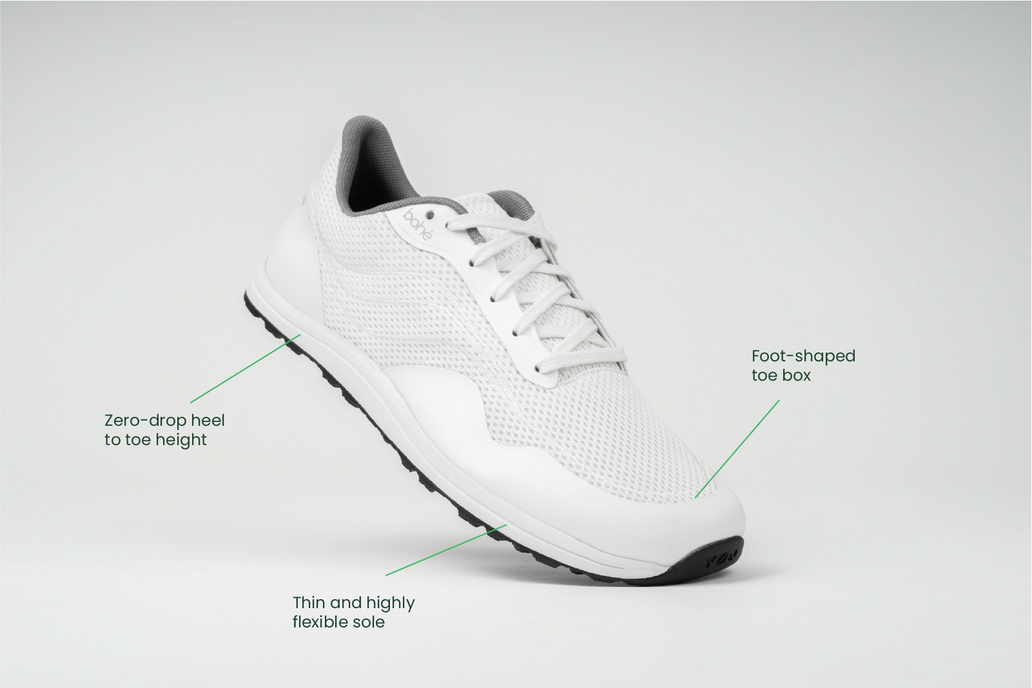 Profile view Bahé Revive barefoot style grounding shoes in Frost (white) with shoe benefits callouts