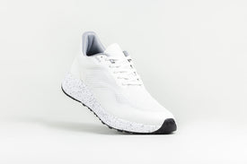 Dynamic/angled view of Bahé Recharge grounding shoes in Frost (white)