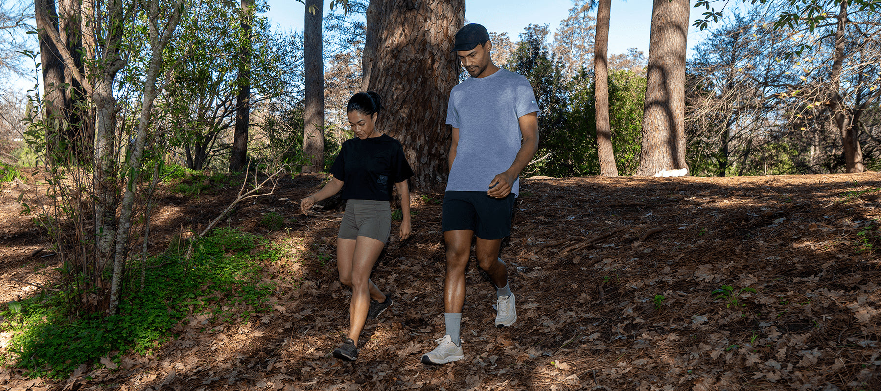 Man and woman walking in Bahé shoes