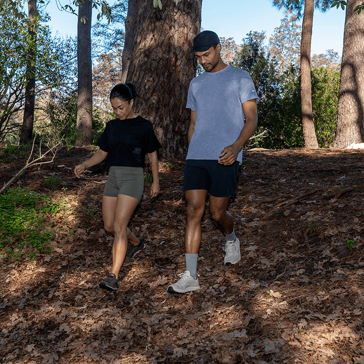 Man and woman walking in Bahé shoes