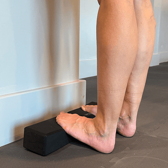 Calf stretch on a step