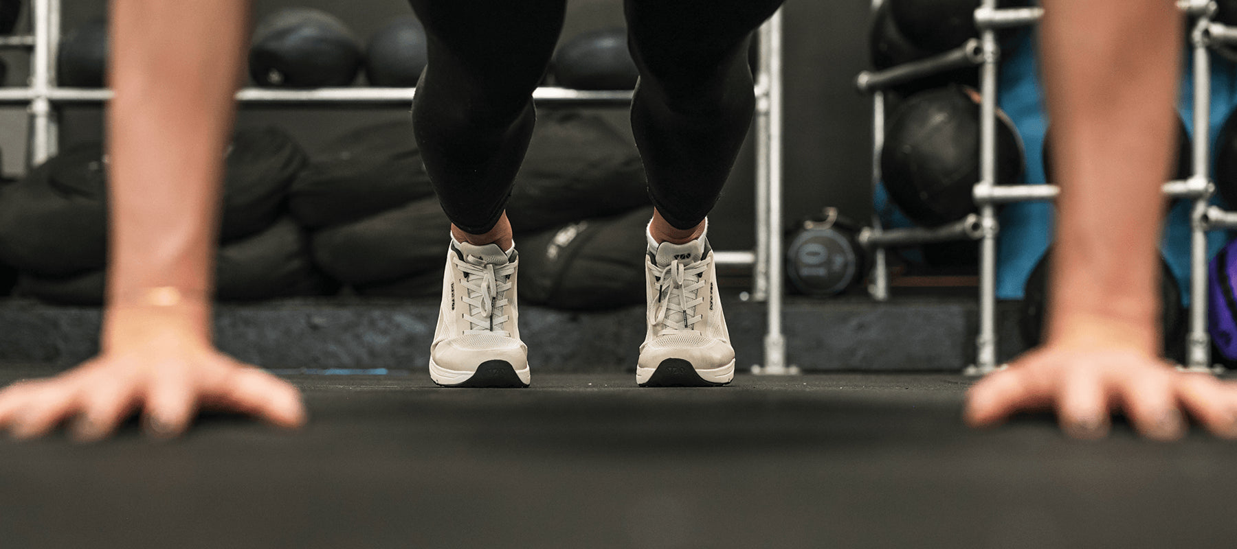 Woman stretching in barefoot shoes