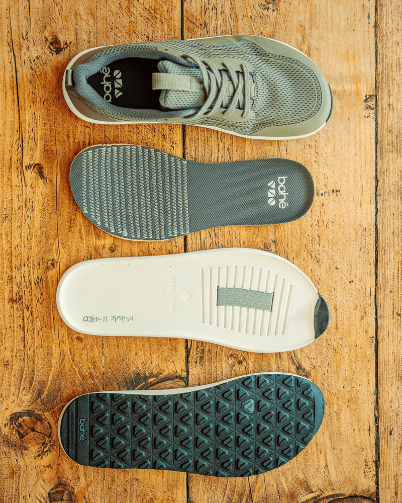 Revive Modes with sole and heel counter displayed on a wooden surface, to show where the grounding technology sits