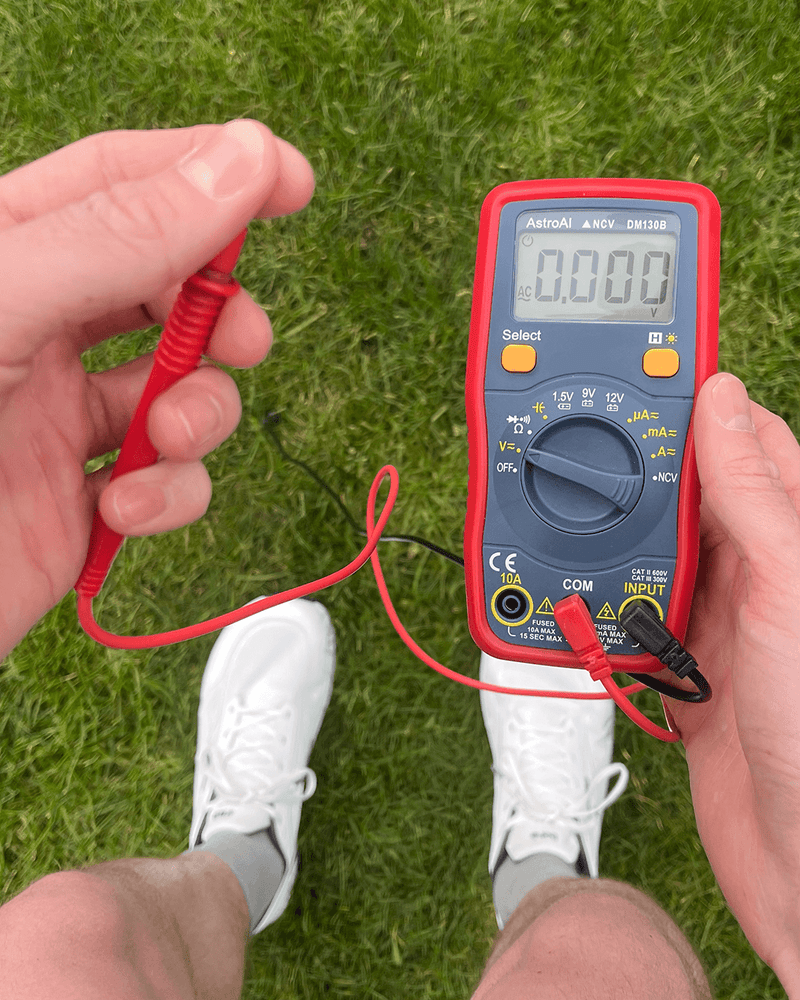 Multimeter testing grounding shoes. 