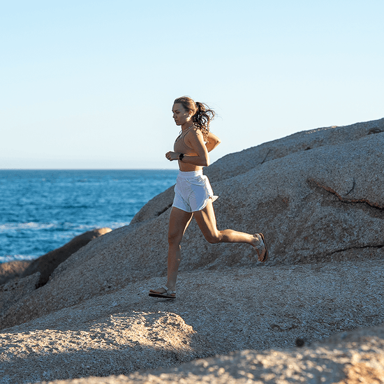 Bahé Respire grounding sandal on woman running