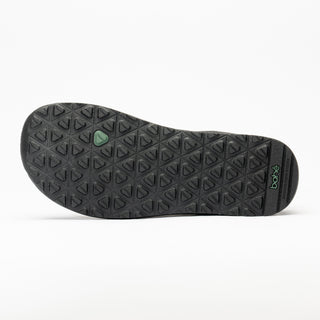 Black sole of a shoe with a brand logo on a white background
