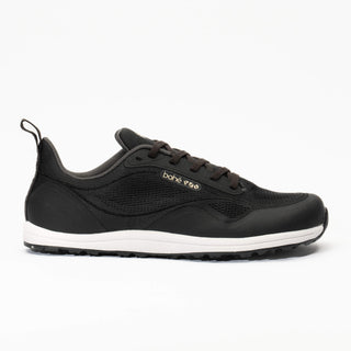 Black sneaker with white sole on a white background
