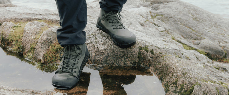 best hiking barefoot boots submerged in water, showing waterproof upper and flexible sole