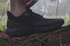 A collection of Bahé Recharge grounding shoes worn in nature 